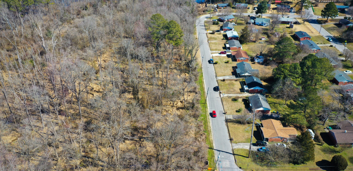 Aerial view of neighborhood with houses and trees