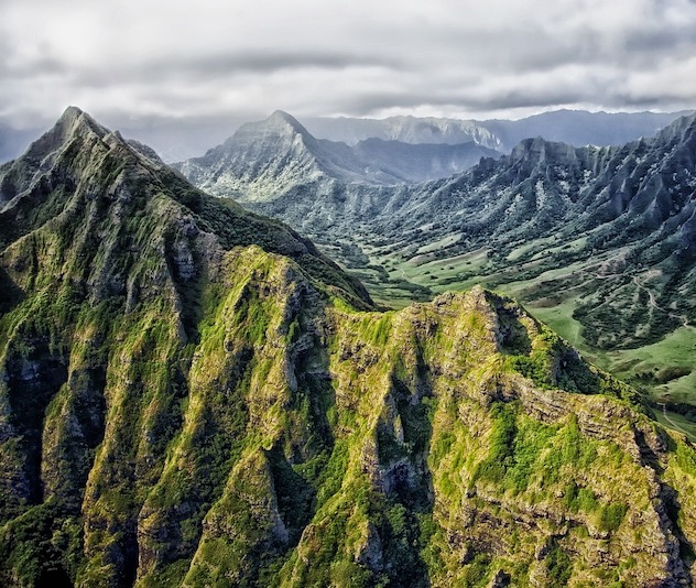 Grassy mountain tops with green valleys inbetween